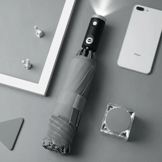 LumenShield - Parapluie pliant, sécurisé, lampe led et bande réfléchissante.